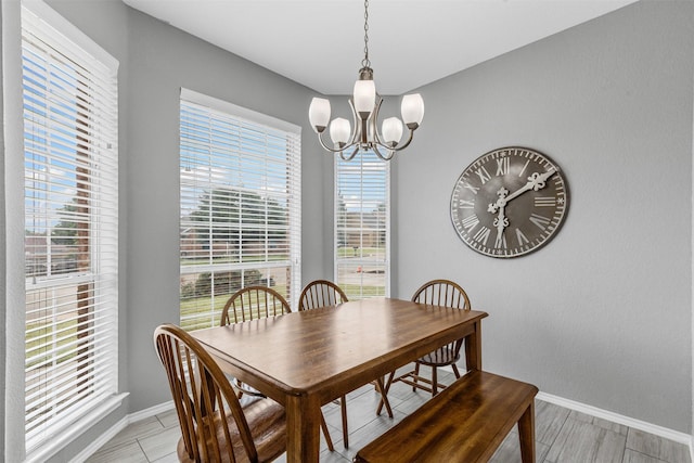 2122 Quail Ridge Dr, Weatherford, TX 76087 - dining area featuring a chandelier and baseboards