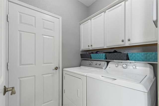 2122 Quail Ridge Dr, Weatherford, TX 76087 - washroom with cabinet space and washing machine and clothes dryer
