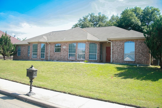 2122 Quail Ridge Dr, Weatherford, TX 76087 - ranch-style home featuring central air condition unit, a front yard, and brick siding