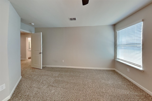 2117 Jeanine Dr, Anna, TX 75409 - unfurnished room with light carpet, a ceiling fan, and baseboards