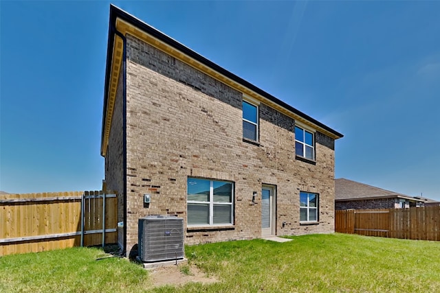 2117 Jeanine Dr, Anna, TX 75409 - back of house with central air condition unit and brick siding