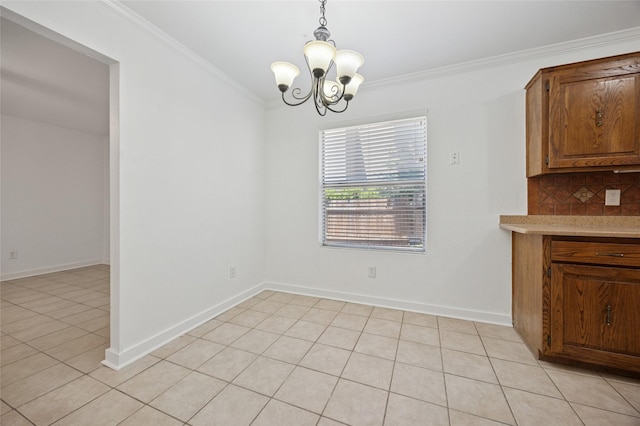 4536 Louisville Dr, Plano, TX 75093 - unfurnished dining area featuring crown molding, a chandelier, light tile patterned floors, and baseboards