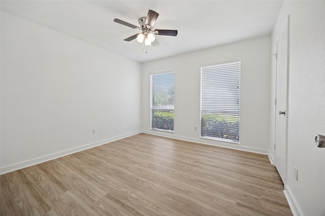 4536 Louisville Dr, Plano, TX 75093 - unfurnished room featuring light wood finished floors, a ceiling fan, and baseboards