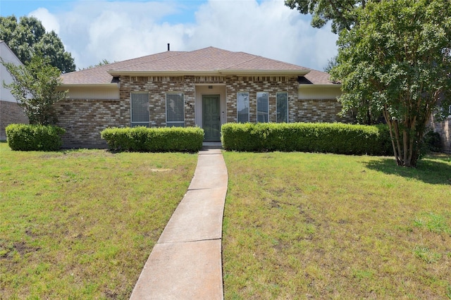 4536 Louisville Dr, Plano, TX 75093 - view of front of property with brick siding and a front yard