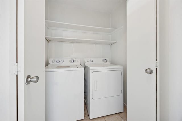 4536 Louisville Dr, Plano, TX 75093 - laundry room featuring washing machine and dryer and light tile patterned floors