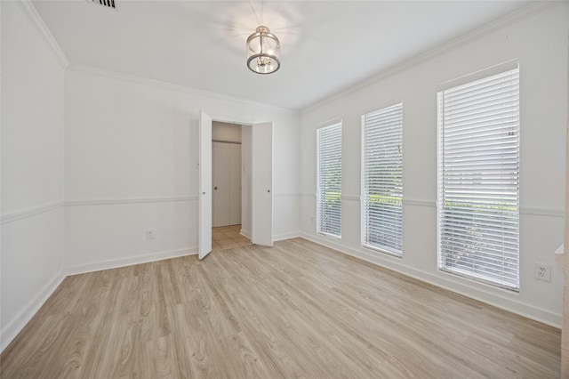 4536 Louisville Dr, Plano, TX 75093 - unfurnished room with light wood finished floors, ornamental molding, and baseboards