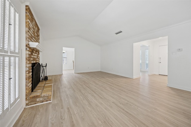 4536 Louisville Dr, Plano, TX 75093 - unfurnished living room featuring a fireplace, light wood-style floors, lofted ceiling, and baseboards