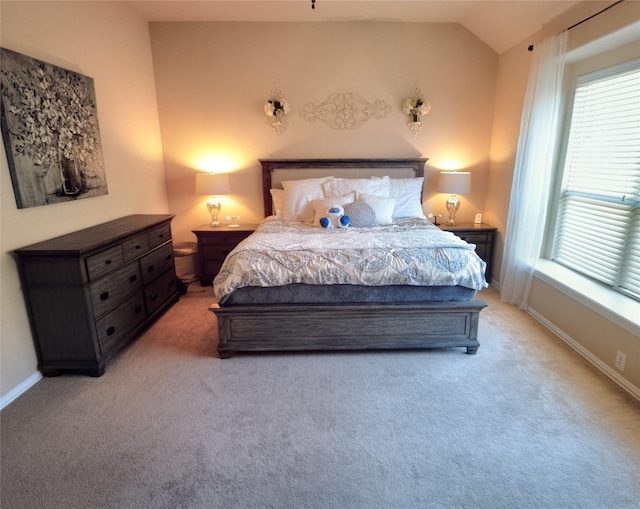 2608 Pine Trail Dr, Little Elm, TX 75068 - bedroom with light carpet, lofted ceiling, multiple windows, and baseboards