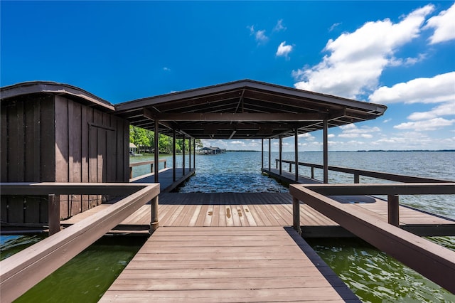 188 Enchanted Dr, Enchanted Oaks, TX 75156 - dock featuring boat lift and a water view