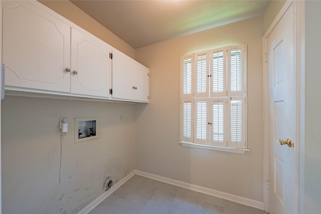 188 Enchanted Dr, Enchanted Oaks, TX 75156 - laundry room featuring cabinet space, hookup for a washing machine, baseboards, and hookup for an electric dryer