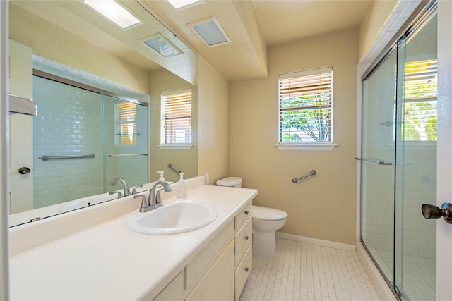 188 Enchanted Dr, Enchanted Oaks, TX 75156 - full bath with a stall shower, vanity, toilet, and healthy amount of natural light