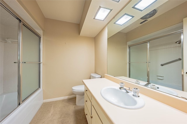 188 Enchanted Dr, Enchanted Oaks, TX 75156 - bathroom featuring toilet, vanity, enclosed tub / shower combo, and baseboards
