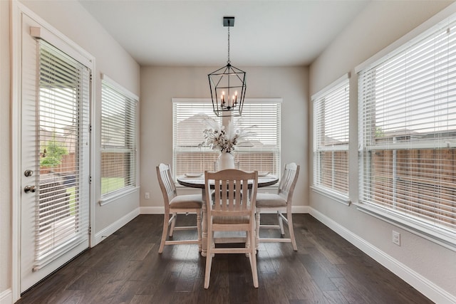 10321 Colina Dr, Fort Worth, TX 76126 - dining area with a chandelier, baseboards, and dark wood-type flooring