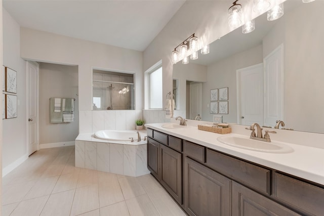 10321 Colina Dr, Fort Worth, TX 76126 - bathroom with a bath, double vanity, tile patterned flooring, a shower, and baseboards