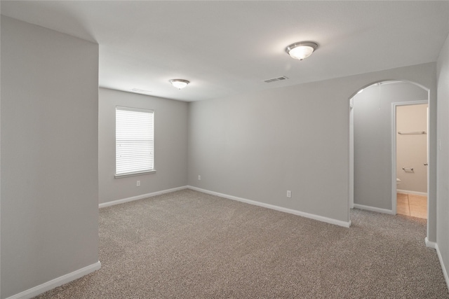 134 Kennedy Dr, Venus, TX 76084 - carpeted spare room with arched walkways and baseboards