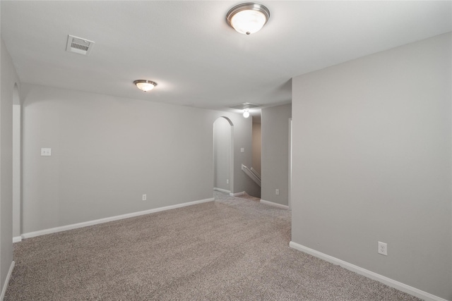 134 Kennedy Dr, Venus, TX 76084 - carpeted spare room featuring arched walkways and baseboards