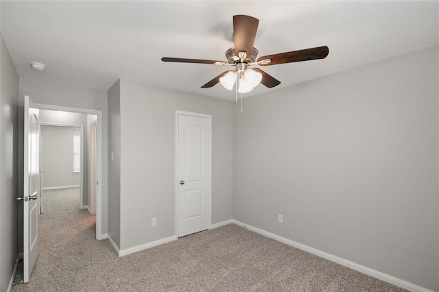 134 Kennedy Dr, Venus, TX 76084 - unfurnished bedroom featuring light colored carpet, baseboards, and a ceiling fan