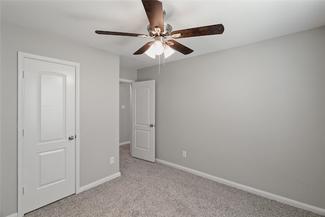 134 Kennedy Dr, Venus, TX 76084 - unfurnished bedroom with light colored carpet, baseboards, and ceiling fan