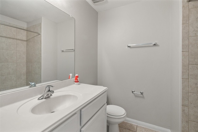 134 Kennedy Dr, Venus, TX 76084 - bathroom featuring vanity, toilet, tile patterned floors, and a tile shower