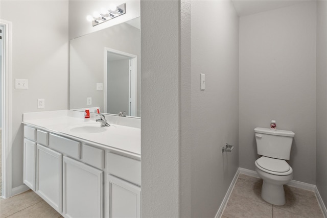 134 Kennedy Dr, Venus, TX 76084 - bathroom featuring tile patterned floors, toilet, vanity, and baseboards