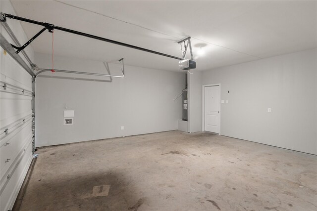 134 Kennedy Dr, Venus, TX 76084 - garage with a garage door opener