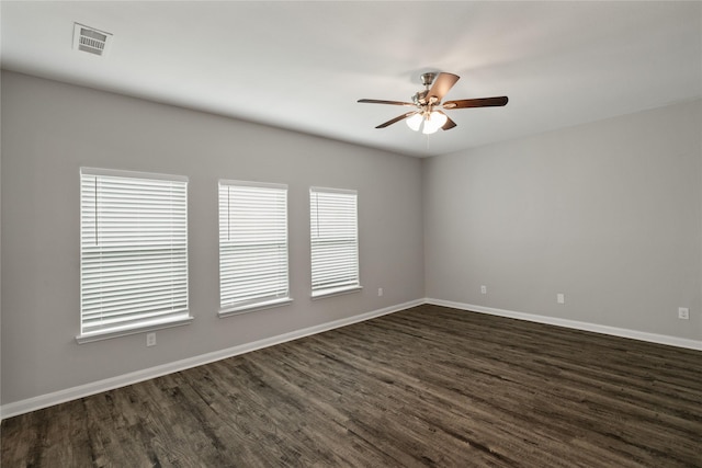 134 Kennedy Dr, Venus, TX 76084 - unfurnished room with a ceiling fan, dark wood-style flooring, and baseboards
