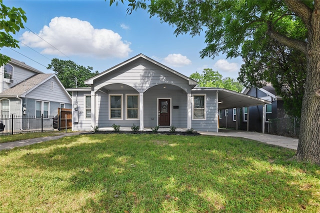 634 N Tyler St, Dallas, TX 75208 - view of front of property featuring an attached carport, covered porch, and concrete driveway