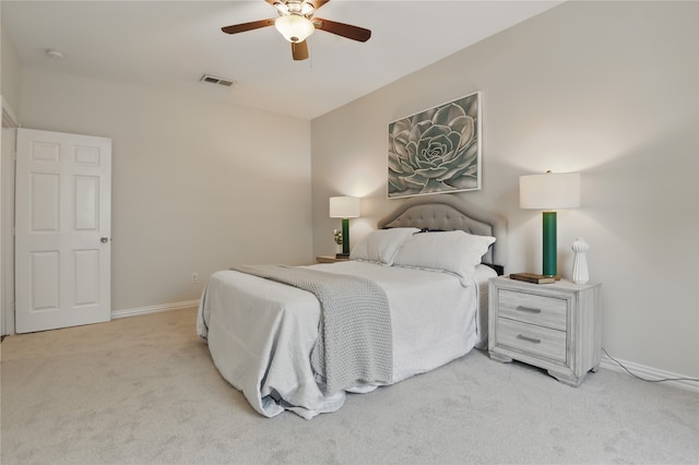 634 N Tyler St, Dallas, TX 75208 - bedroom featuring light colored carpet, baseboards, and ceiling fan