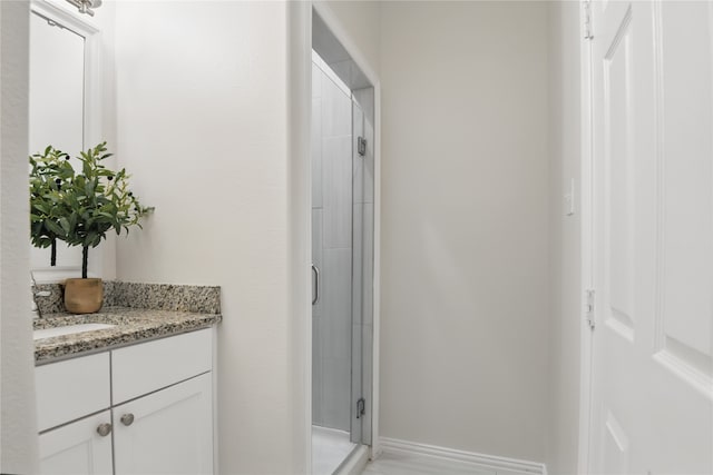 634 N Tyler St, Dallas, TX 75208 - bathroom with vanity and a shower stall