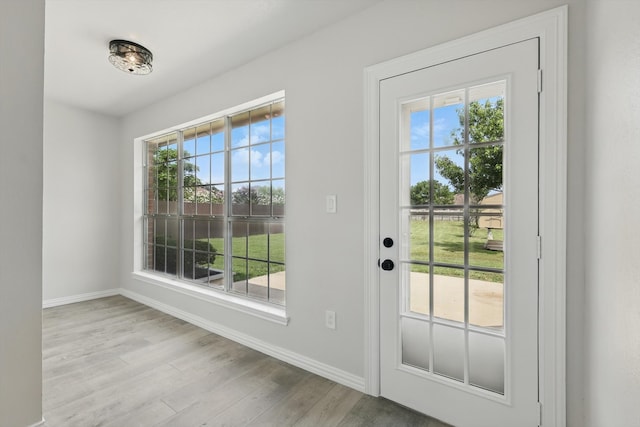 130 N Point Dr, Krum, TX 76249 - entryway with baseboards and wood finished floors