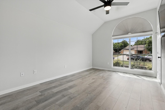 130 N Point Dr, Krum, TX 76249 - spare room featuring a ceiling fan, wood finished floors, vaulted ceiling, and baseboards