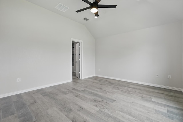 130 N Point Dr, Krum, TX 76249 - spare room featuring a ceiling fan, lofted ceiling, wood finished floors, and baseboards