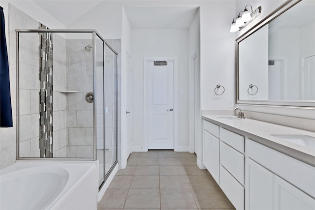 7244 Montosa Trl, Fort Worth, TX 76131 - full bathroom with a shower stall, a garden tub, double vanity, and tile patterned floors