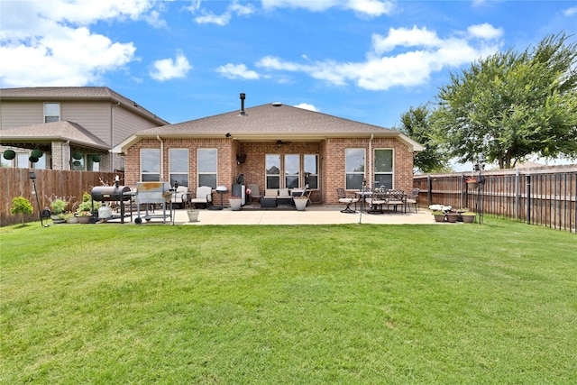 7244 Montosa Trl, Fort Worth, TX 76131 - rear view of house with a fenced backyard, brick siding, a patio area, and a ceiling fan
