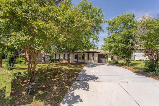 704 Vine St, Euless, TX 76040 - single story home with an attached garage, driveway, and a front yard
