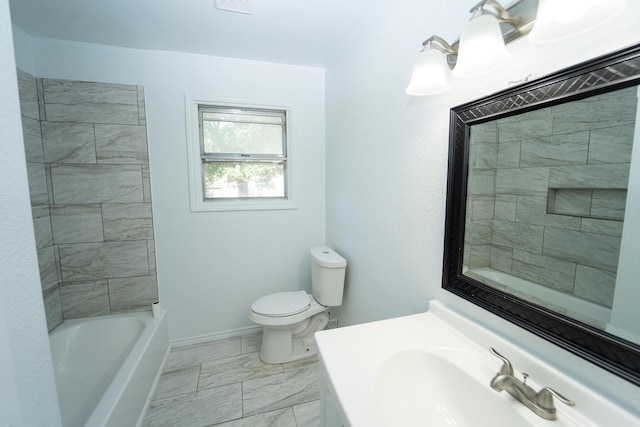 704 Vine St, Euless, TX 76040 - full bath featuring toilet, vanity, baseboards, marble look tiles, and shower / tub combination
