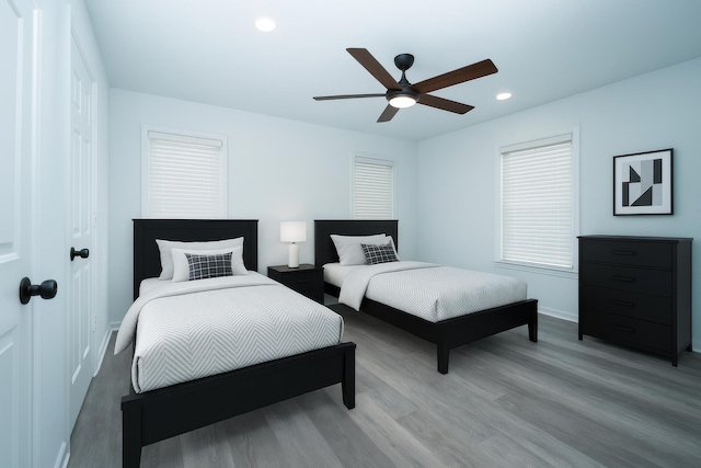 704 Vine St, Euless, TX 76040 - bedroom featuring wood finished floors, baseboards, recessed lighting, and ceiling fan