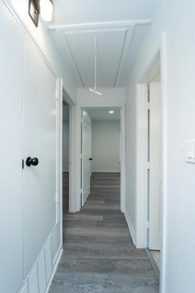 704 Vine St, Euless, TX 76040 - corridor featuring attic access and wood finished floors