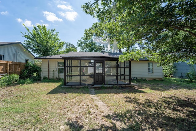 704 Vine St, Euless, TX 76040 - rear view of house with a sunroom