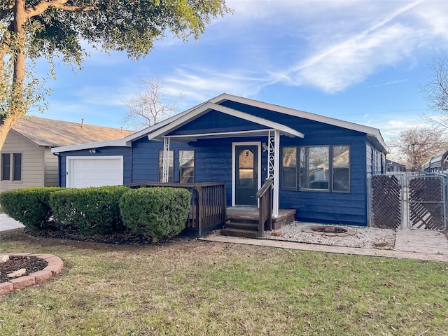 5729 Blackmore Ave, Fort Worth, TX 76107 - view of front of house featuring an attached garage, a fire pit, and a porch