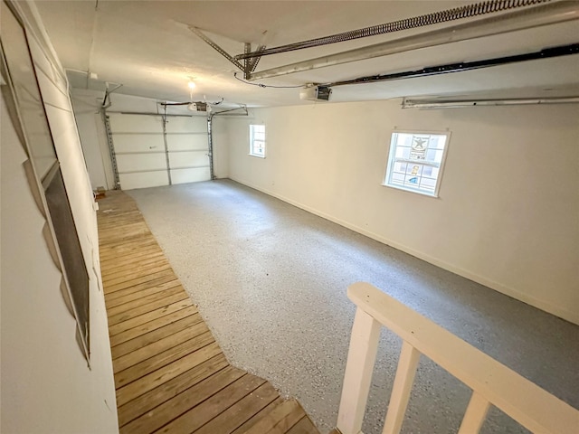 5729 Blackmore Ave, Fort Worth, TX 76107 - garage with a garage door opener and baseboards