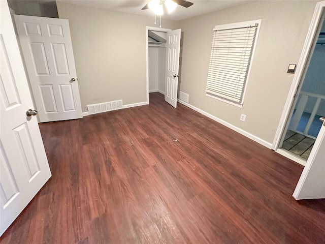 5729 Blackmore Ave, Fort Worth, TX 76107 - unfurnished bedroom with dark wood finished floors, baseboards, a closet, and a ceiling fan