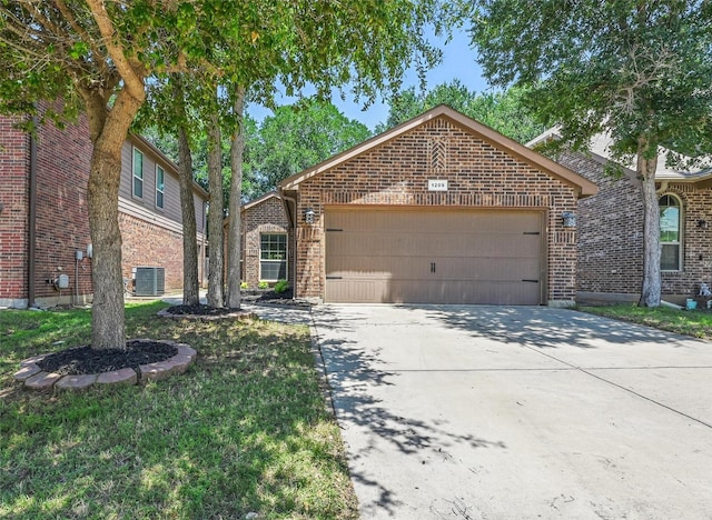 1209 Briarwood Dr, Azle, TX 76020 - view of front of home with brick siding, an attached garage, concrete driveway, and central AC