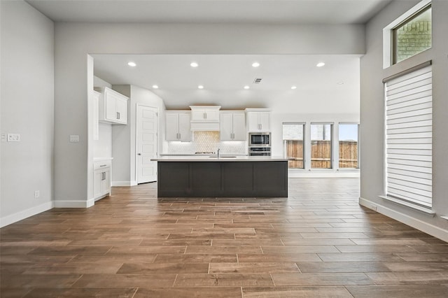 1419 Misty Pasture Way, Mansfield, TX 76063 - kitchen featuring wood finished floors, stainless steel appliances, white cabinetry, light countertops, and a sink