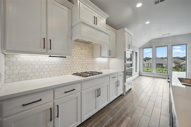 1419 Misty Pasture Way, Mansfield, TX 76063 - kitchen with stainless steel appliances, recessed lighting, light countertops, white cabinetry, and dark wood-style floors