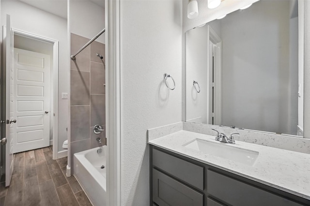 1419 Misty Pasture Way, Mansfield, TX 76063 - full bath with vanity, wood finished floors, washtub / shower combination, and toilet