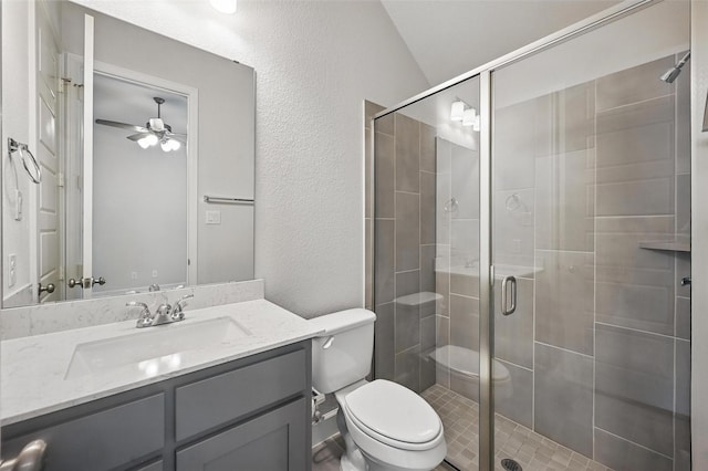 1419 Misty Pasture Way, Mansfield, TX 76063 - bathroom featuring toilet, vanity, ceiling fan, a textured wall, and a shower stall