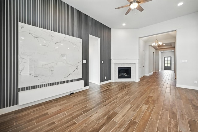 1419 Misty Pasture Way, Mansfield, TX 76063 - unfurnished living room featuring ceiling fan, wood finished floors, recessed lighting, baseboards, and a brick fireplace