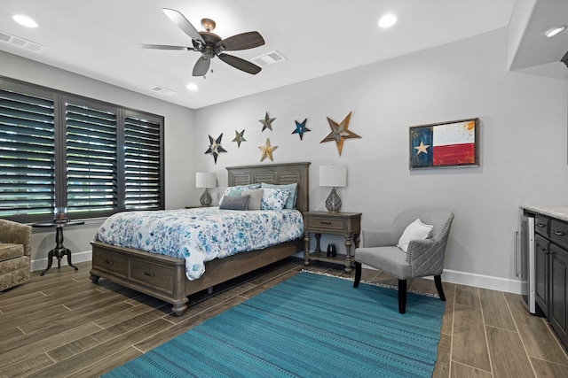 8217 American Way, Denton, TX 76207 - bedroom with wood tiled floors, baseboards, ceiling fan, and recessed lighting