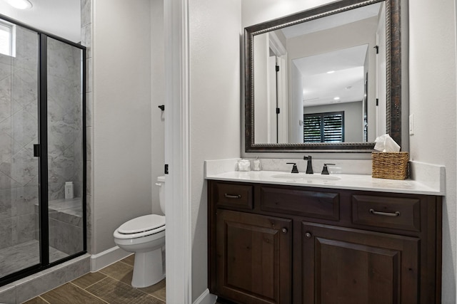 8217 American Way, Denton, TX 76207 - full bathroom with toilet, vanity, a shower stall, recessed lighting, and baseboards